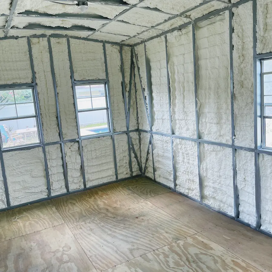 Closed-cell spray foam insulation applied to wall cavities in a residential project in Frankenmuth